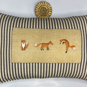 Woodland fox and stripe kidney pillow in