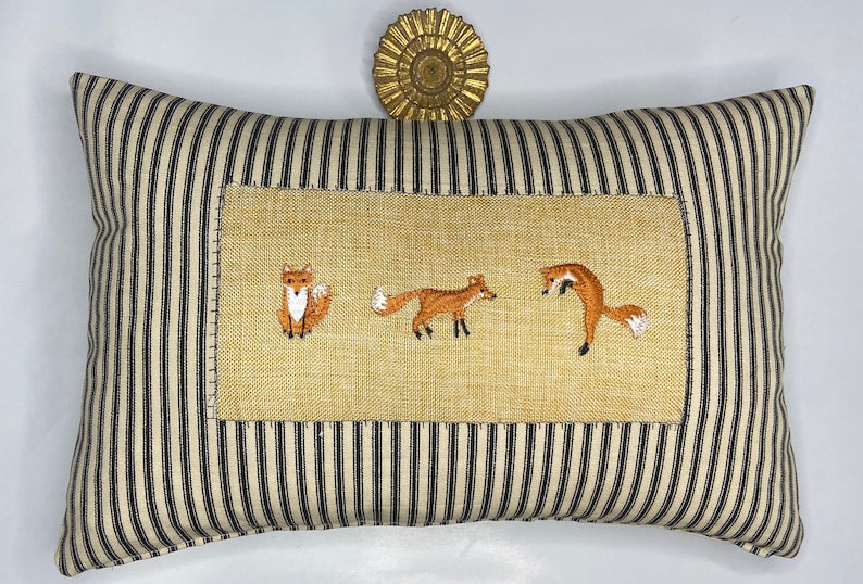 Woodland fox and stripe kidney pillow in