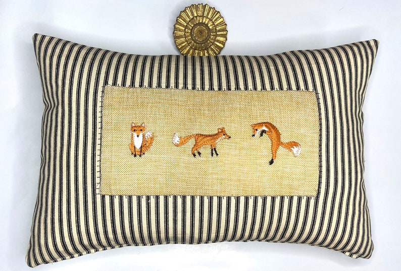 Woodland fox and stripe kidney pillow in